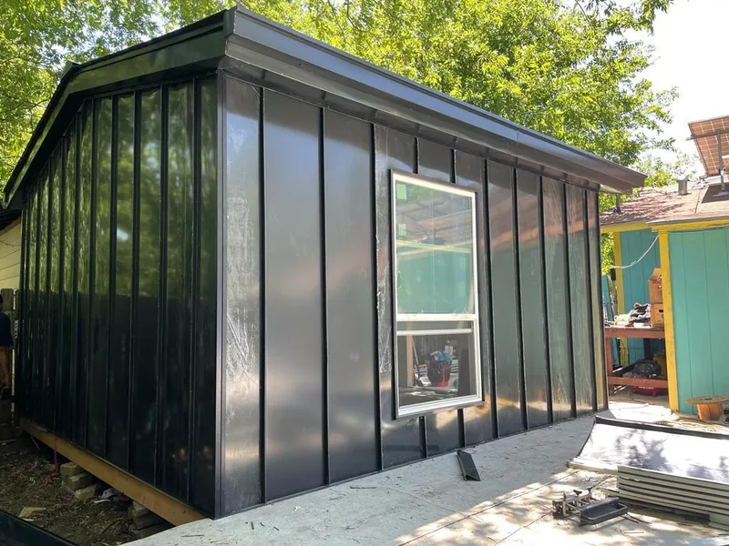Black standing seam metal wall panels for Metal Roof Installation in North Ogden