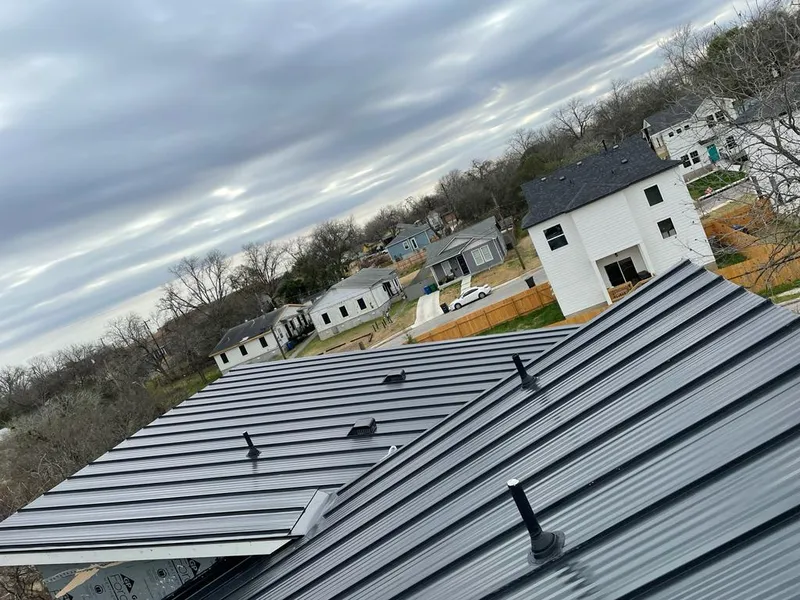 Standing seam metal roof panels with vents for Skylight Repair in North Ogden